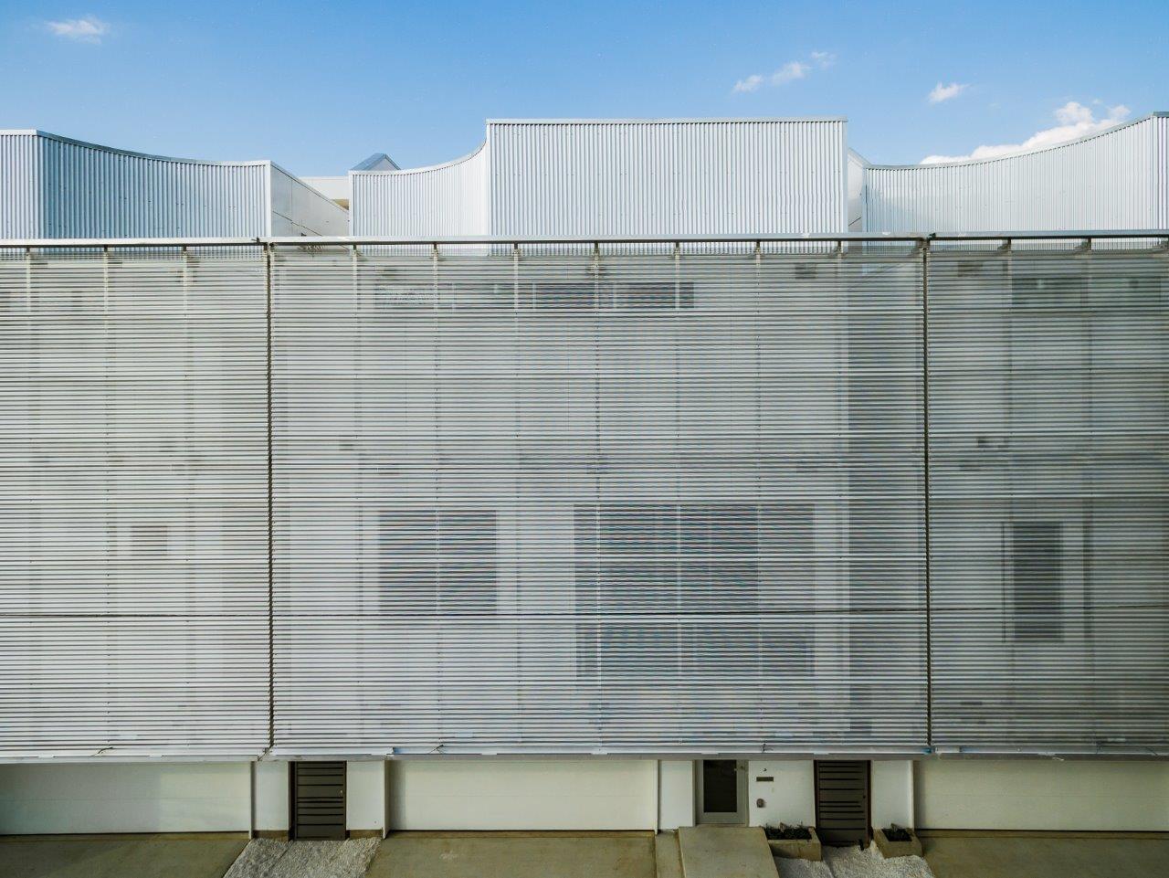 Closer project view of the perforated corrugated metal screen