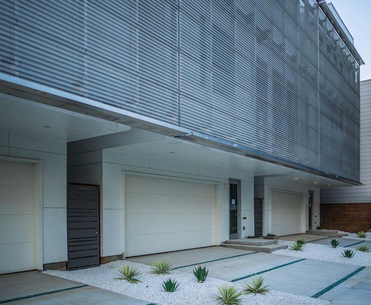 Installed perforated aluminum screen at The Art Colony