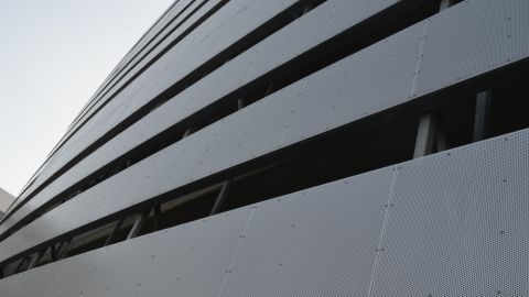 https://www.hendrickcorp.com/sites/default/files/styles/480x270/public/Architectural%20Perforated%20Metal%20Cladding%20-%20Parking%20Structure%20Univ.%20Hospital5.jpg?itok=2lUJh8yH