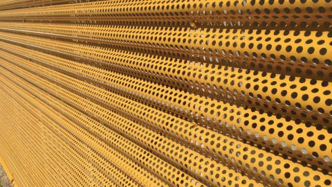 Close Up of Corrugated Perforated Metal Panels