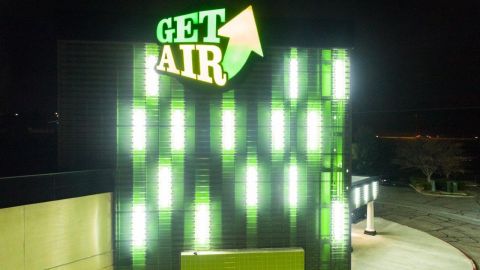 Get Air Building Lit Up With Green Lights at Night