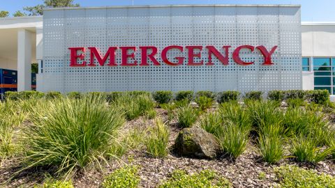 Emergency Sign and Metal Façade