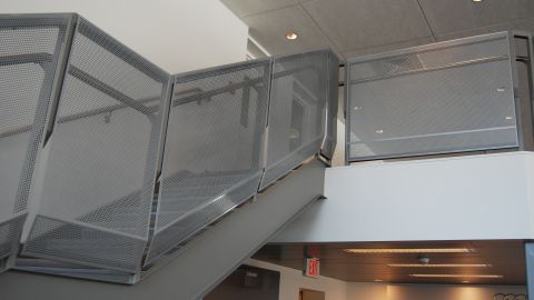 Metal Infill Patterns Installed at a Car Dealership