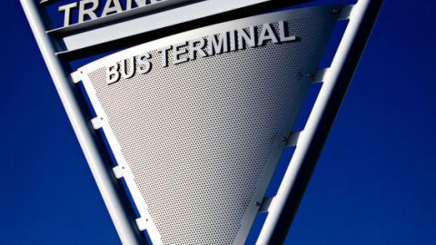 Triangular Bus Terminal Sign Made Out of Perforated Metal