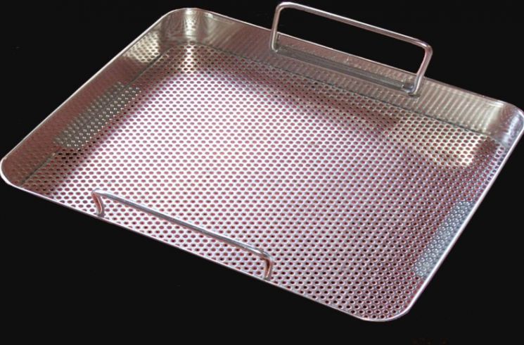 Perforated tray for medical use.