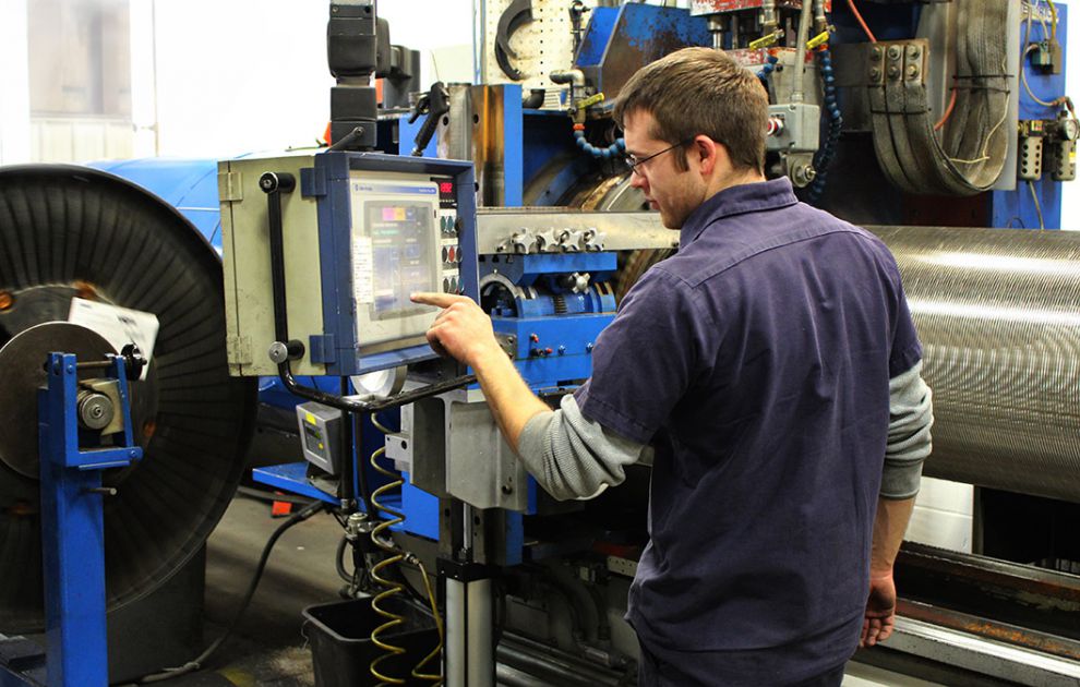 Hendrick Employee Operating Manufacturing Equipment